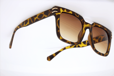 Solbrille med mat leopard gummi touch stel og brune glas